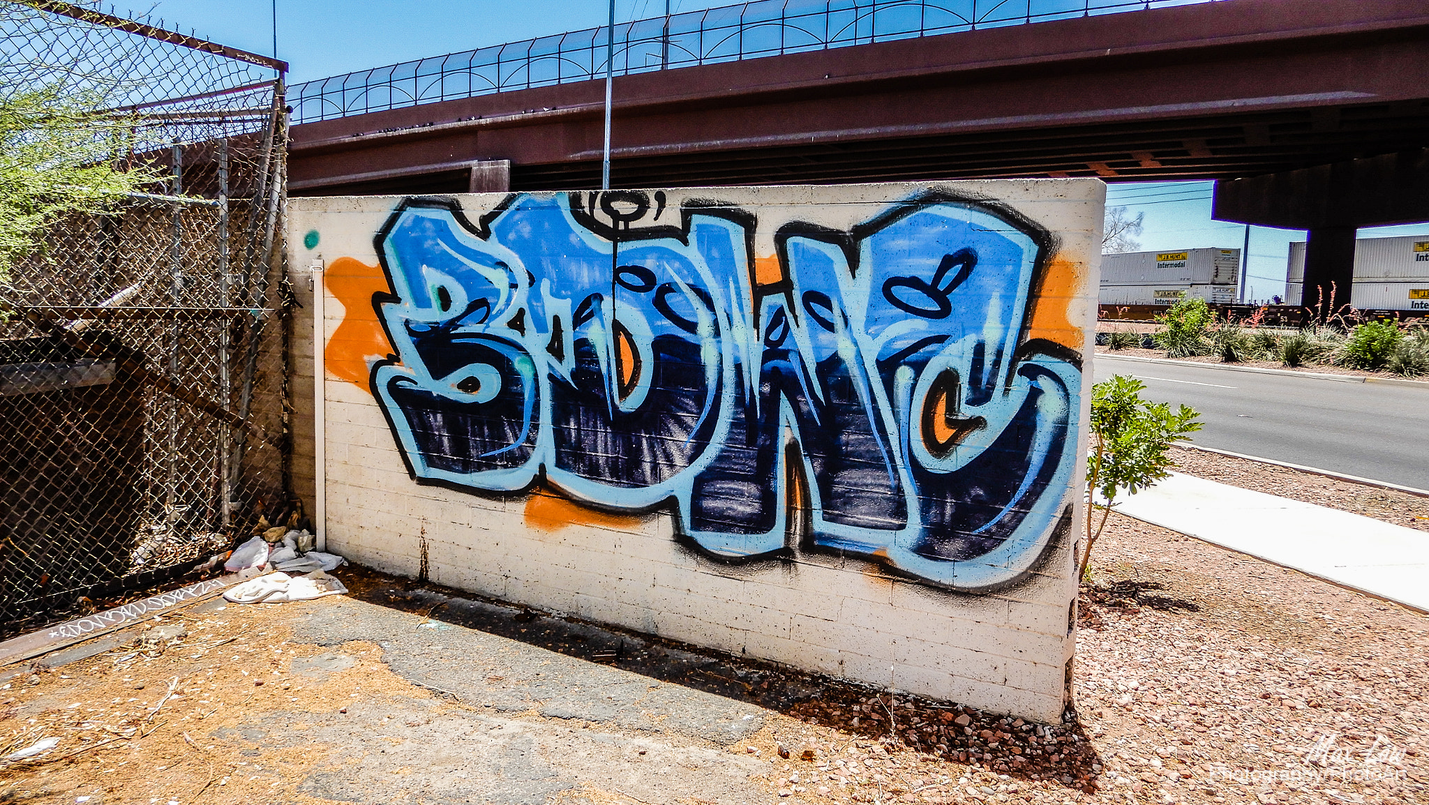 Nikon Coolpix A900 sample photo. Graffiti by the overpass photography