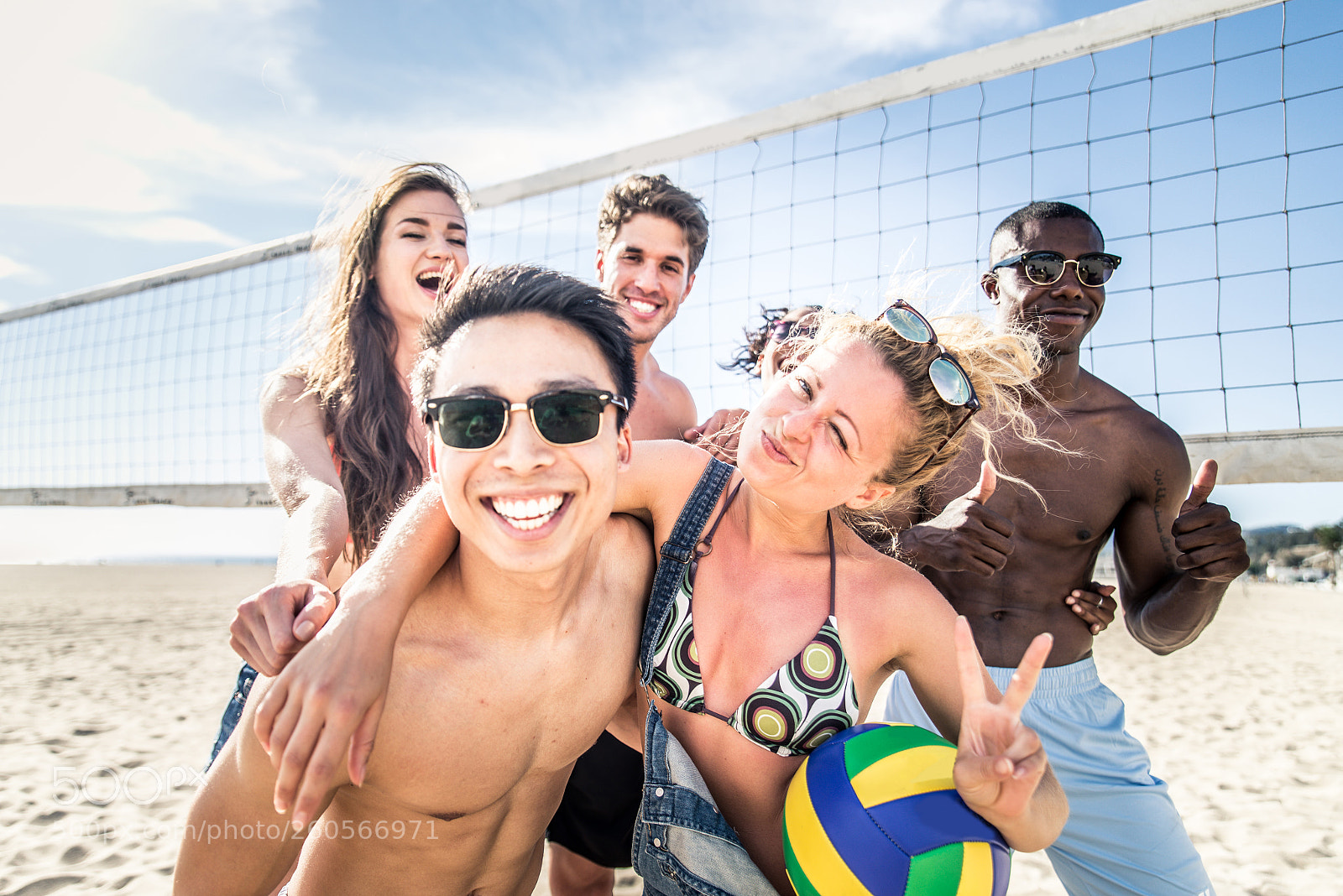 Nikon D610 sample photo. Friends play beach volley photography