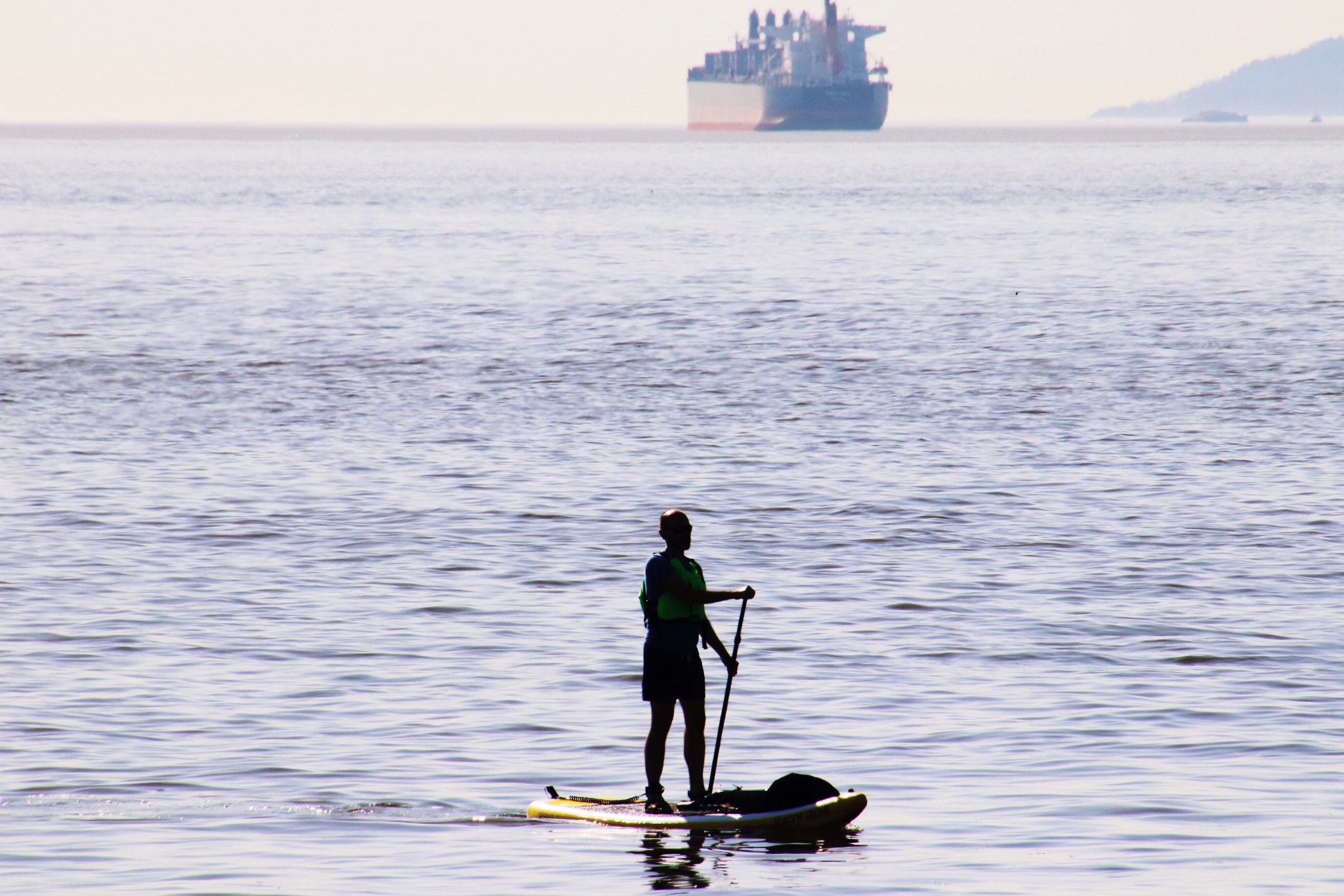 Canon EOS 800D (EOS Rebel T7i / EOS Kiss X9i) sample photo. He paddles in the pacific ocean.   photography
