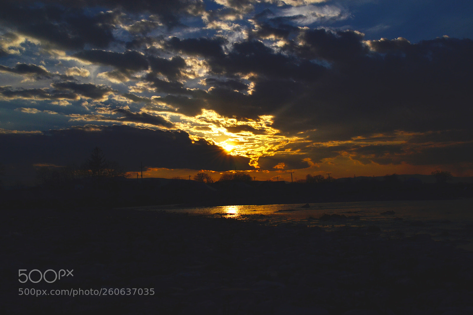 Nikon D3100 sample photo. Sunrise beetwen clouds photography