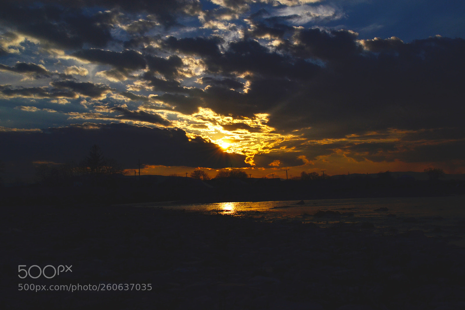 Nikon D3100 sample photo. Sunrise beetwen clouds photography