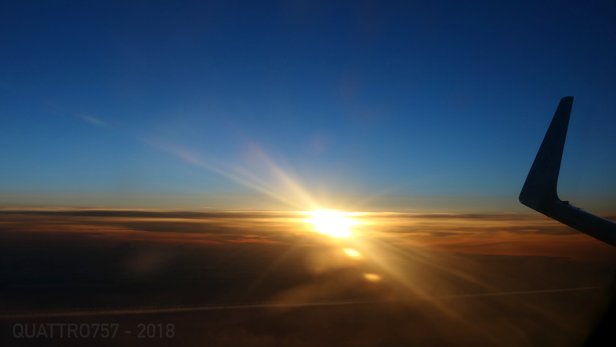 Panasonic DC-TZ200 sample photo. Sunset overflying france photography