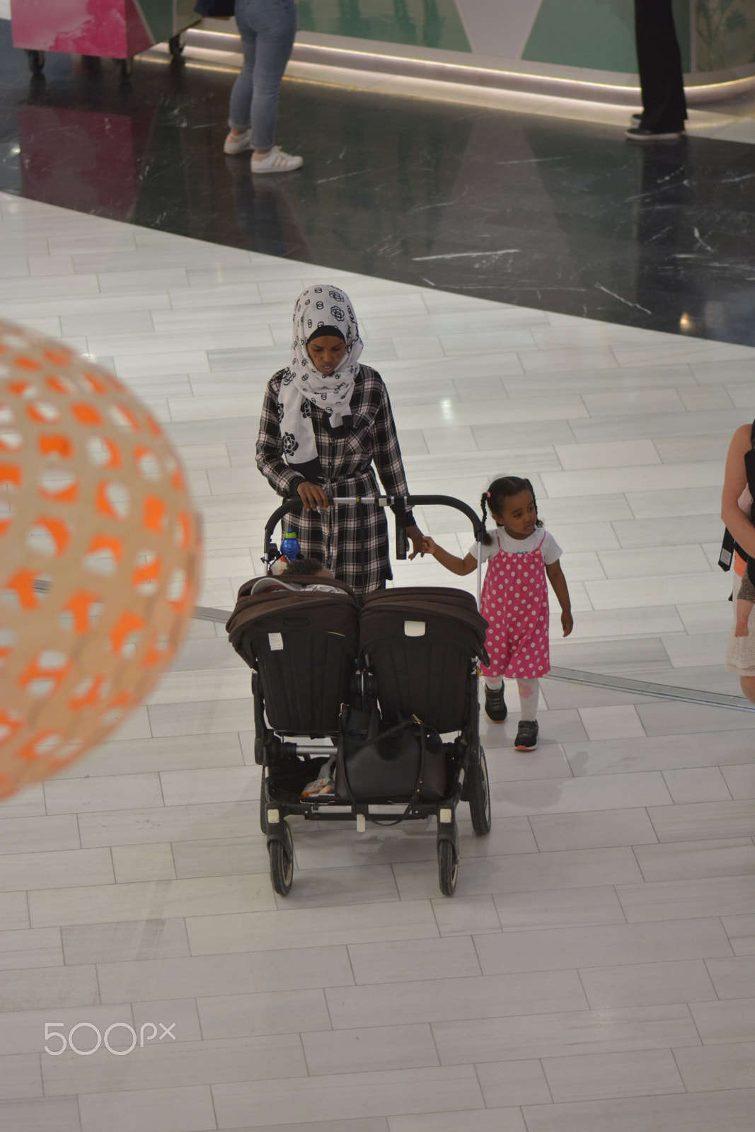 Nikon AF-S Micro-Nikkor 105mm F2.8G IF-ED VR sample photo. Familys and grupes of people are visiting the mall photography