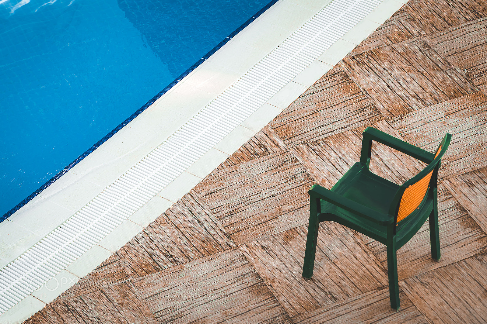 Canon EOS-1D Mark IV sample photo. Chair at the swimming pool photography