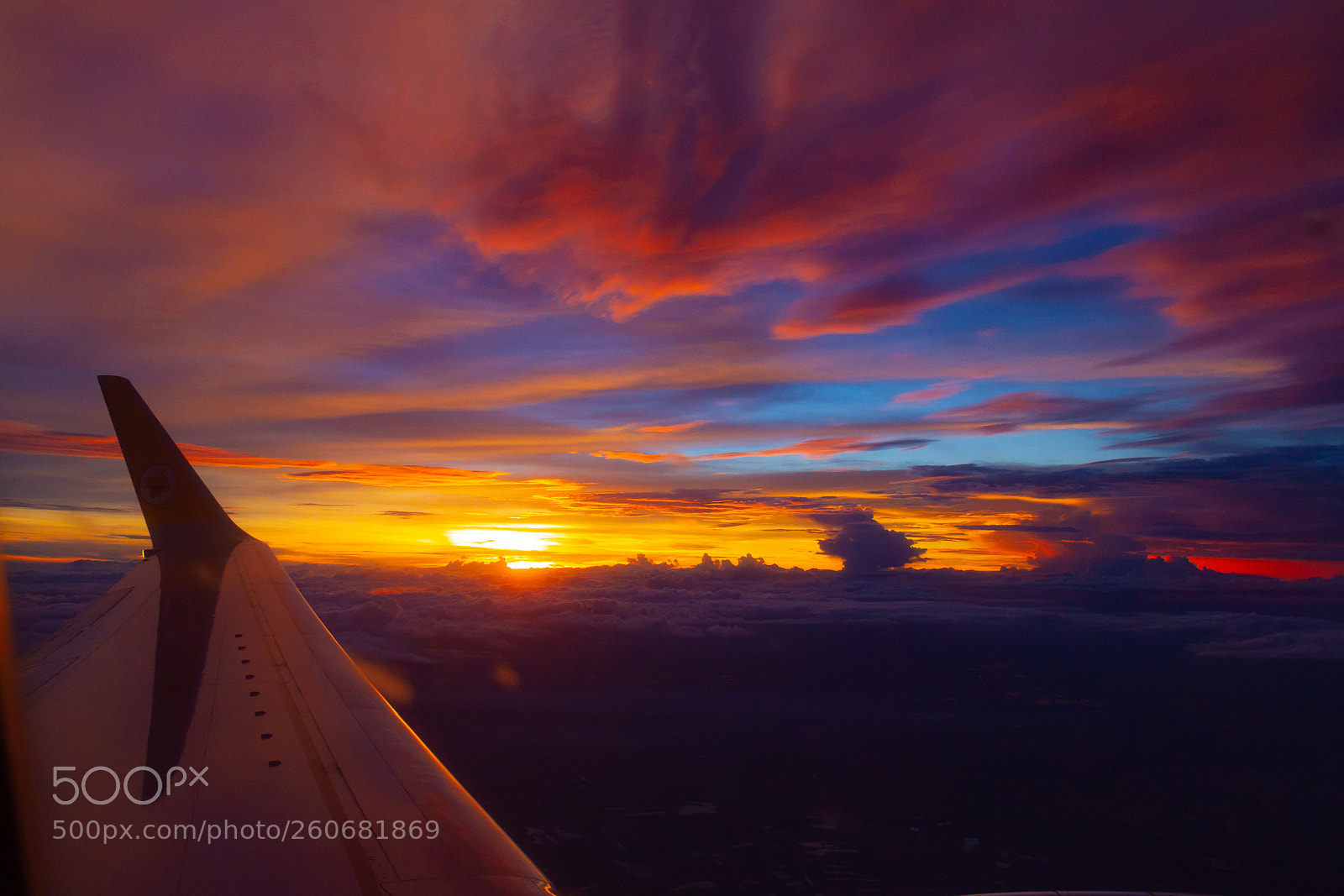 Canon EOS 7D sample photo. Wing of airplane over photography