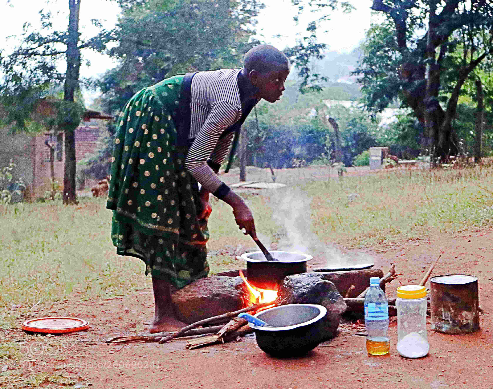 Canon EOS M3 sample photo. Young woman cooking over photography