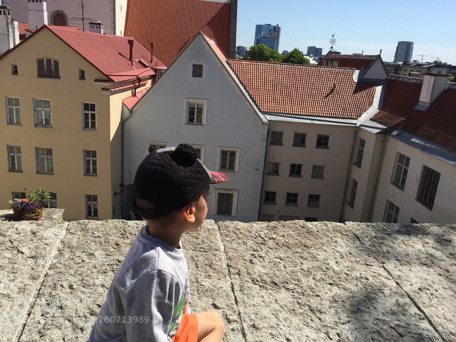 Apple iPhone 6 sample photo. Boy and the roofs photography