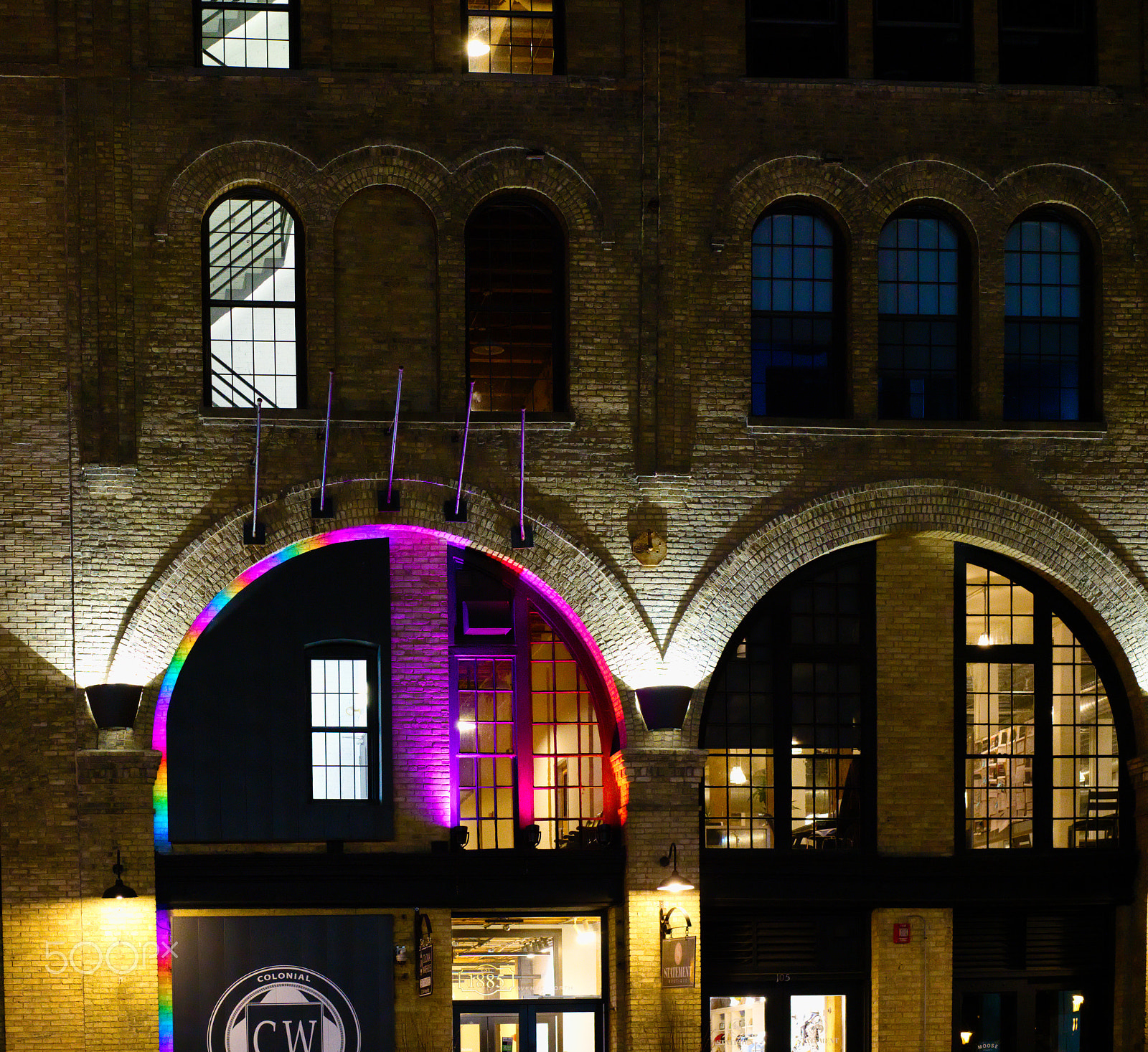 Sony a7R III sample photo. Old brick building with rainbow lighting photography