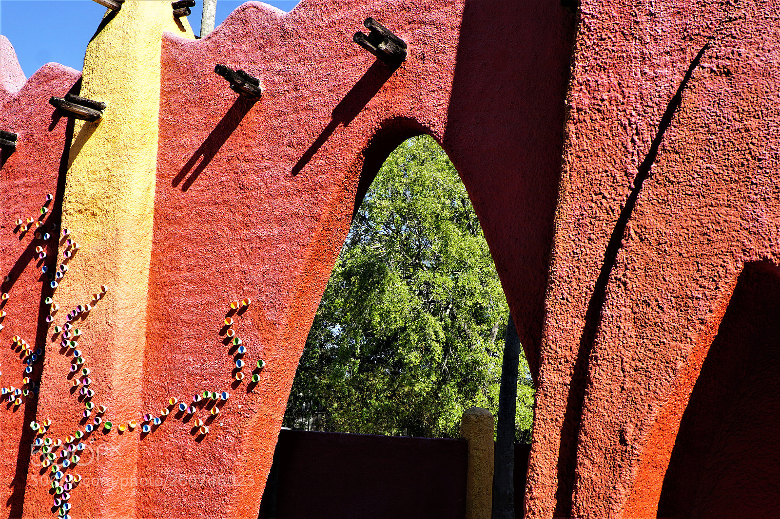 Sony a6000 sample photo. Bldg red stucco mar photography