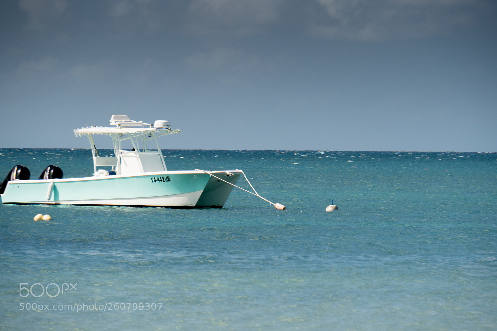 Olympus OM-D E-M5 II sample photo. Caribbean fishing boat photography