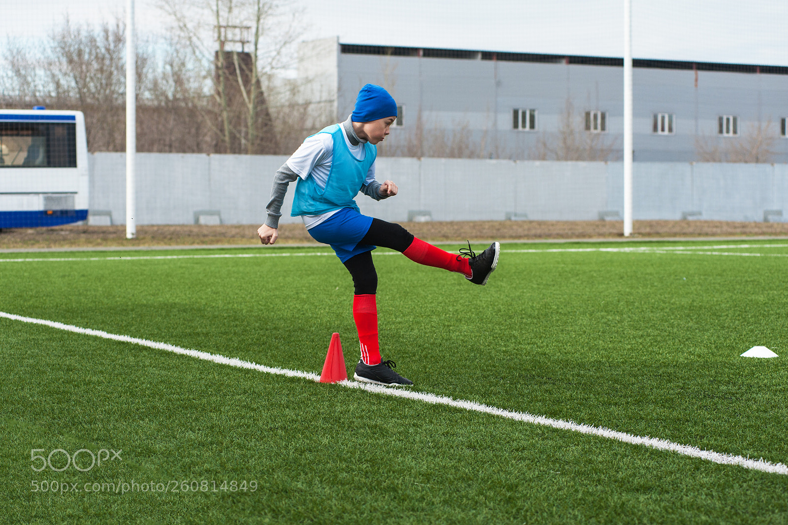 Nikon D700 sample photo. Boy kicking soccer ball photography