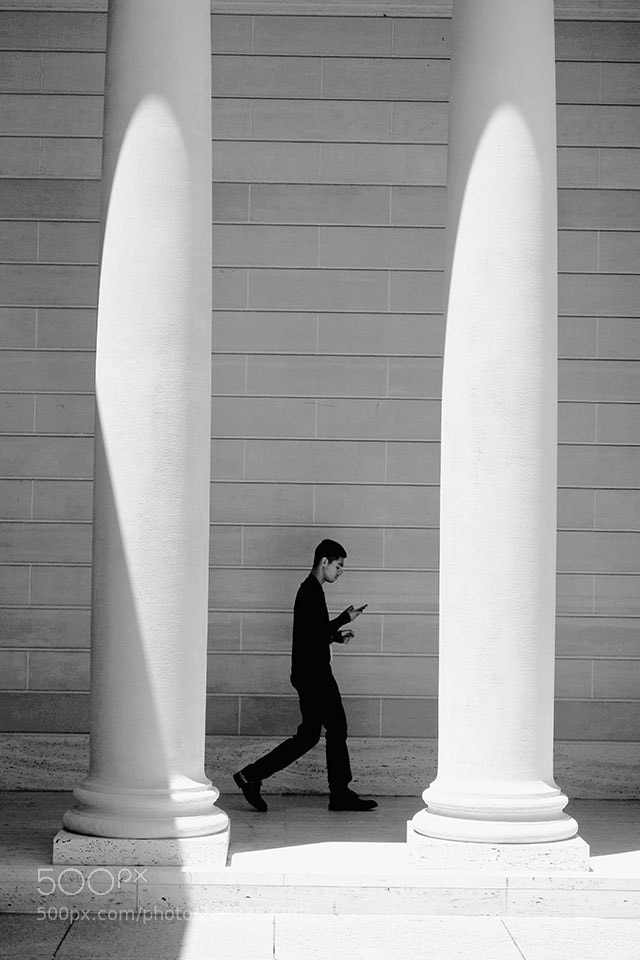 Olympus OM-D E-M1 Mark II sample photo. Walk between columns photography