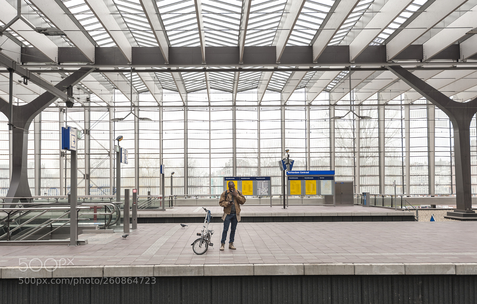 Nikon D700 sample photo. At the train statin photography