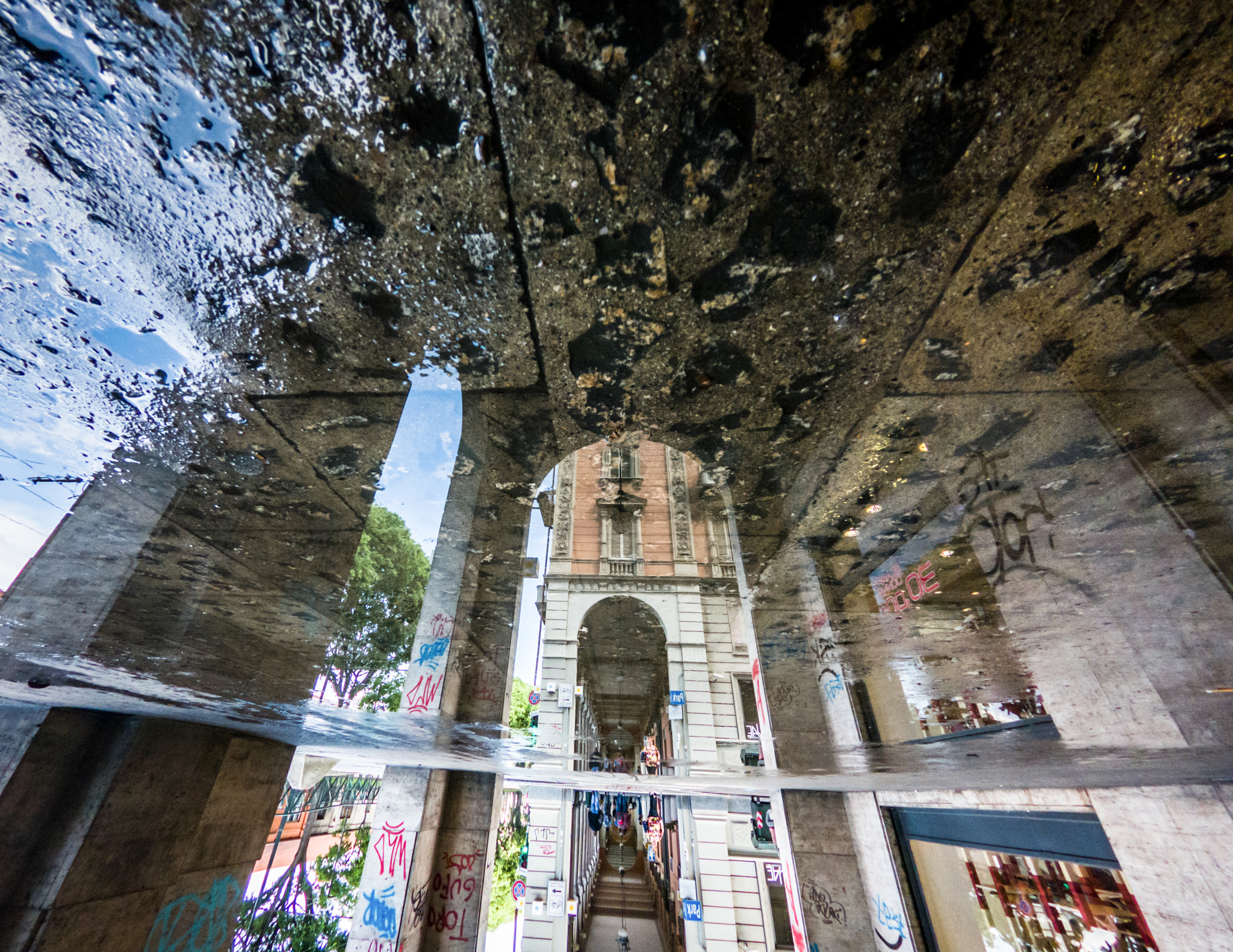 GoPro Hero6 Black sample photo. City streets reflected in the puddle photography