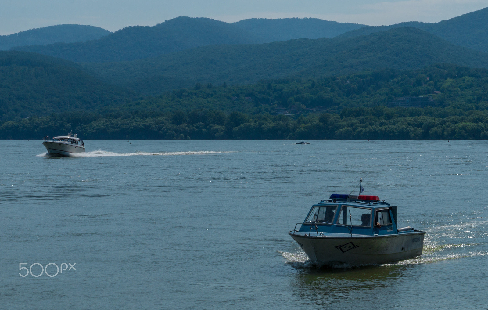 Sony Alpha a5000 (ILCE 5000) sample photo. Ship race, police wins photography