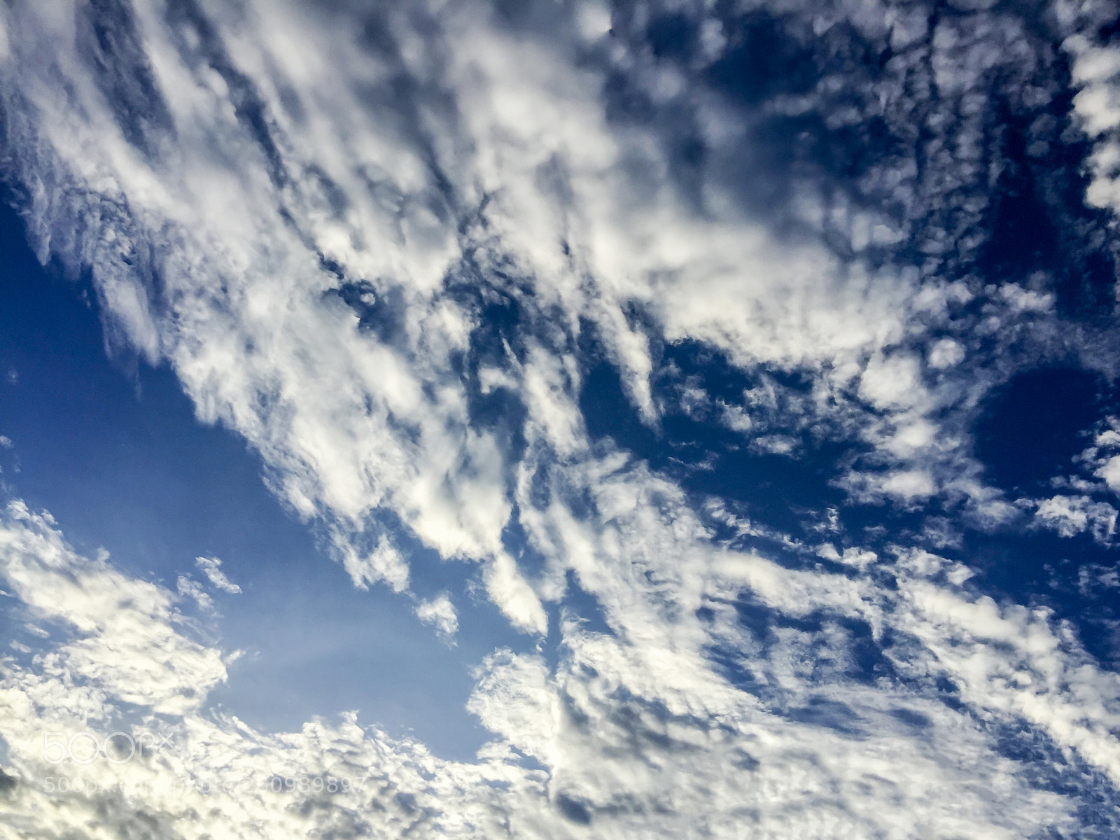 Apple iPhone 6 Plus sample photo. Blue sky with white photography