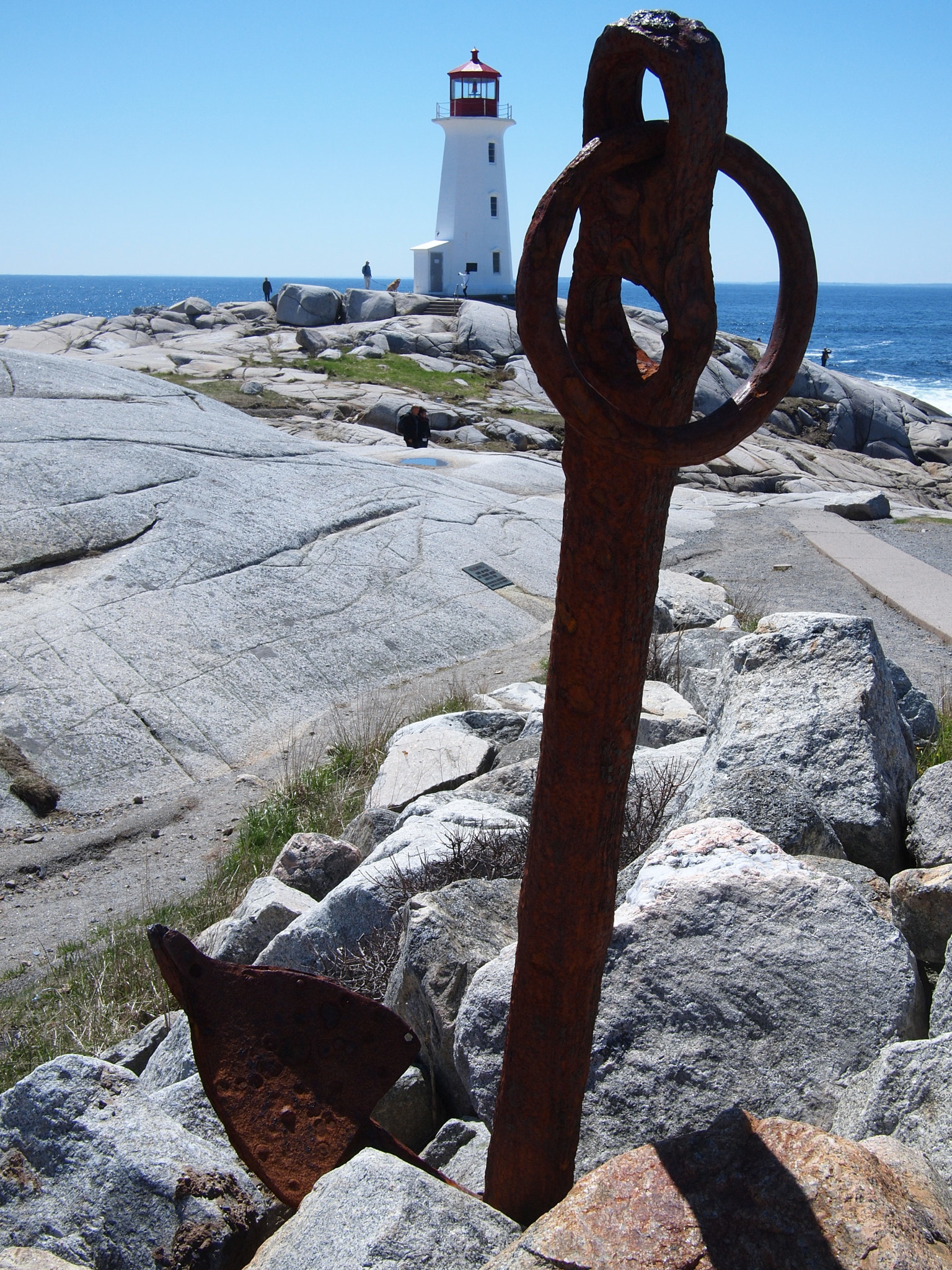Olympus PEN E-P1 sample photo. Rusty anchor at peggy's cove with lighthouse photography