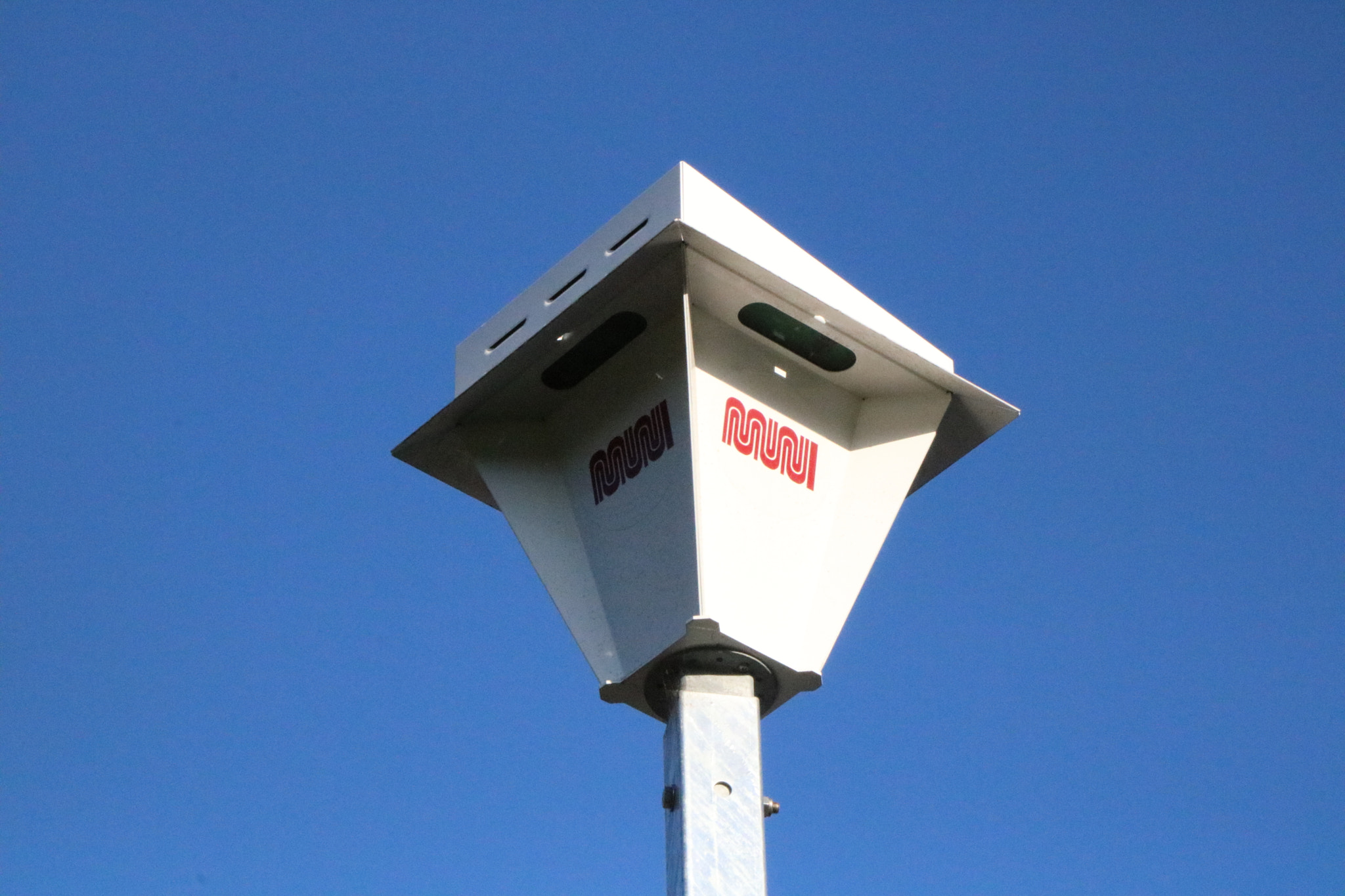 Canon EF-S 17-85mm F4-5.6 IS USM sample photo. Muni sign photography
