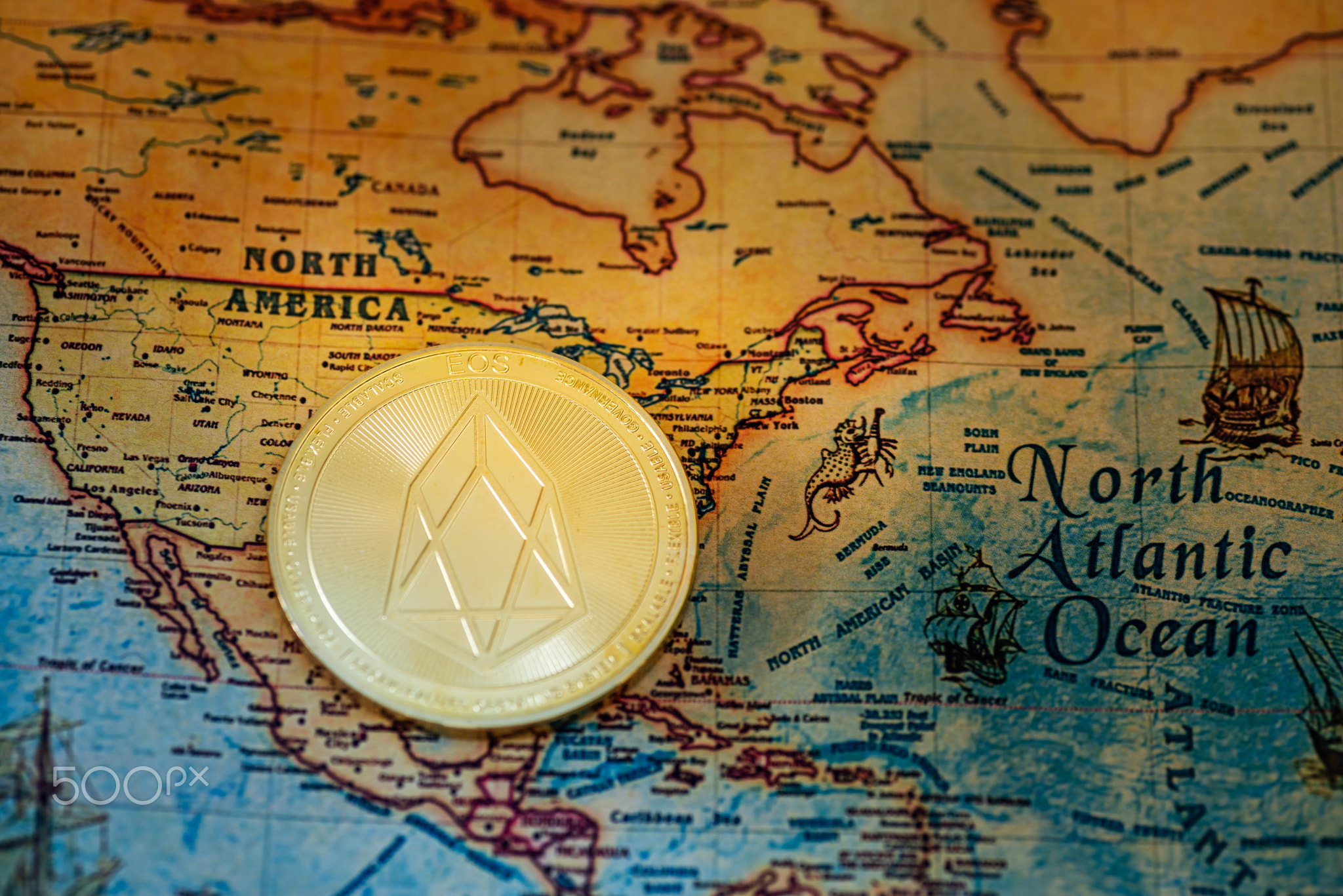 Digital currency concept - Crypto currency bitcoin on map of North America