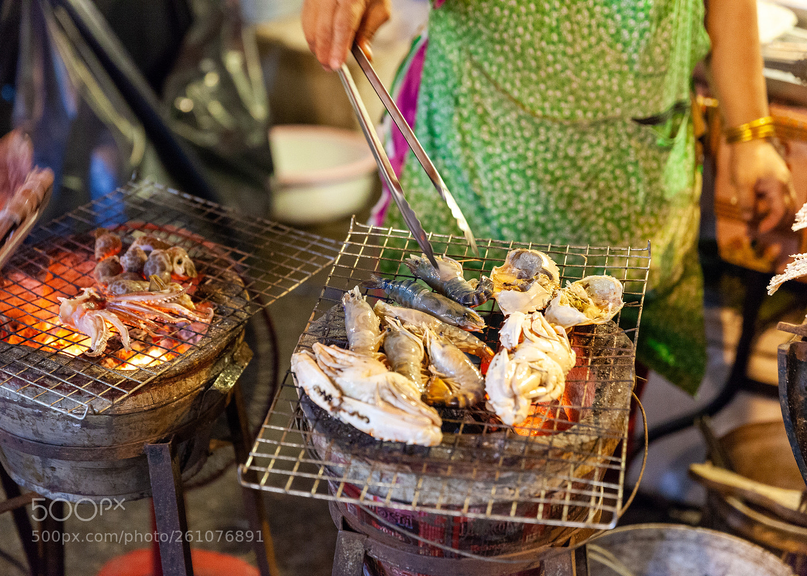 Canon EOS 5D Mark II sample photo. Woman cooks seafood photography