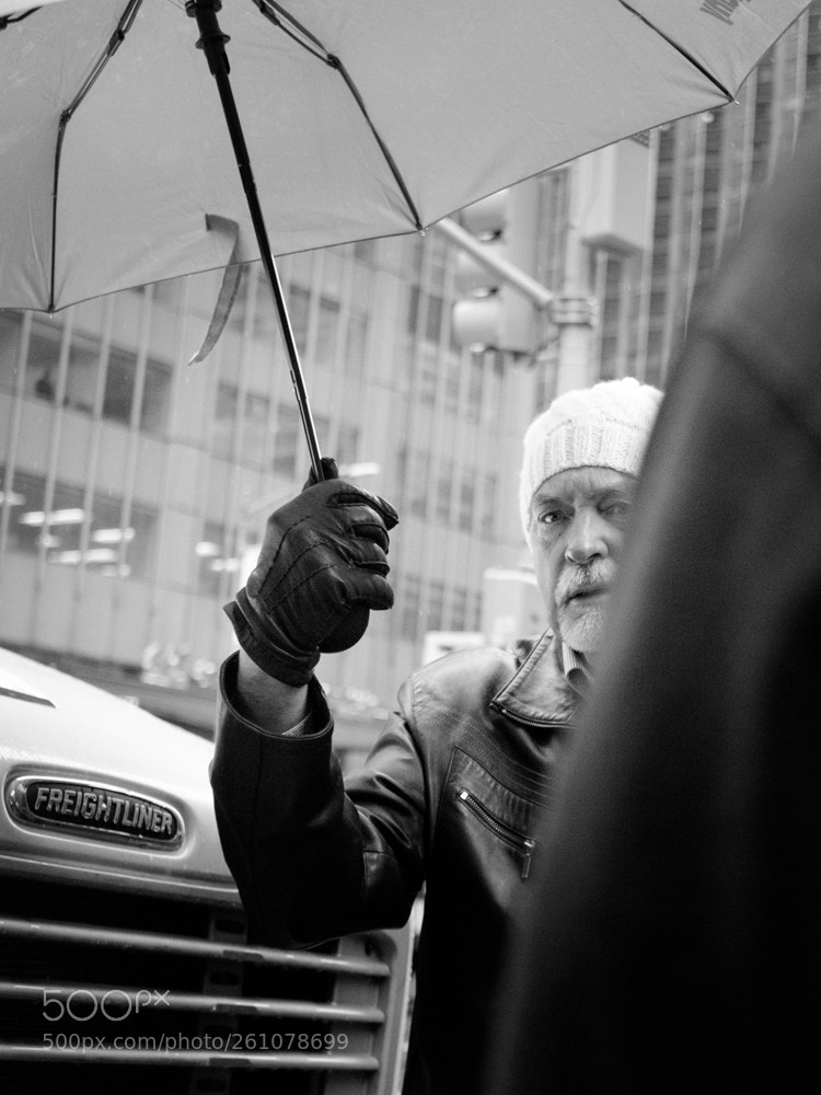 Fujifilm X-T10 sample photo. Raining man photography