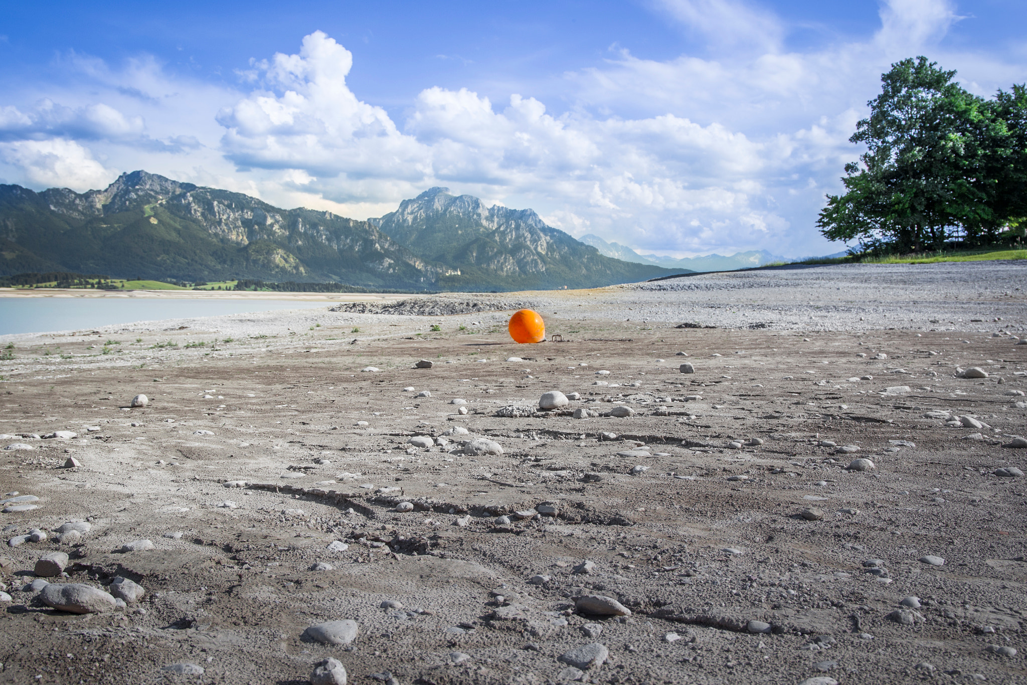 Canon EOS-1D Mark IV sample photo. A buoy lies on the gravel at the bottom of the dried-up reservoi photography