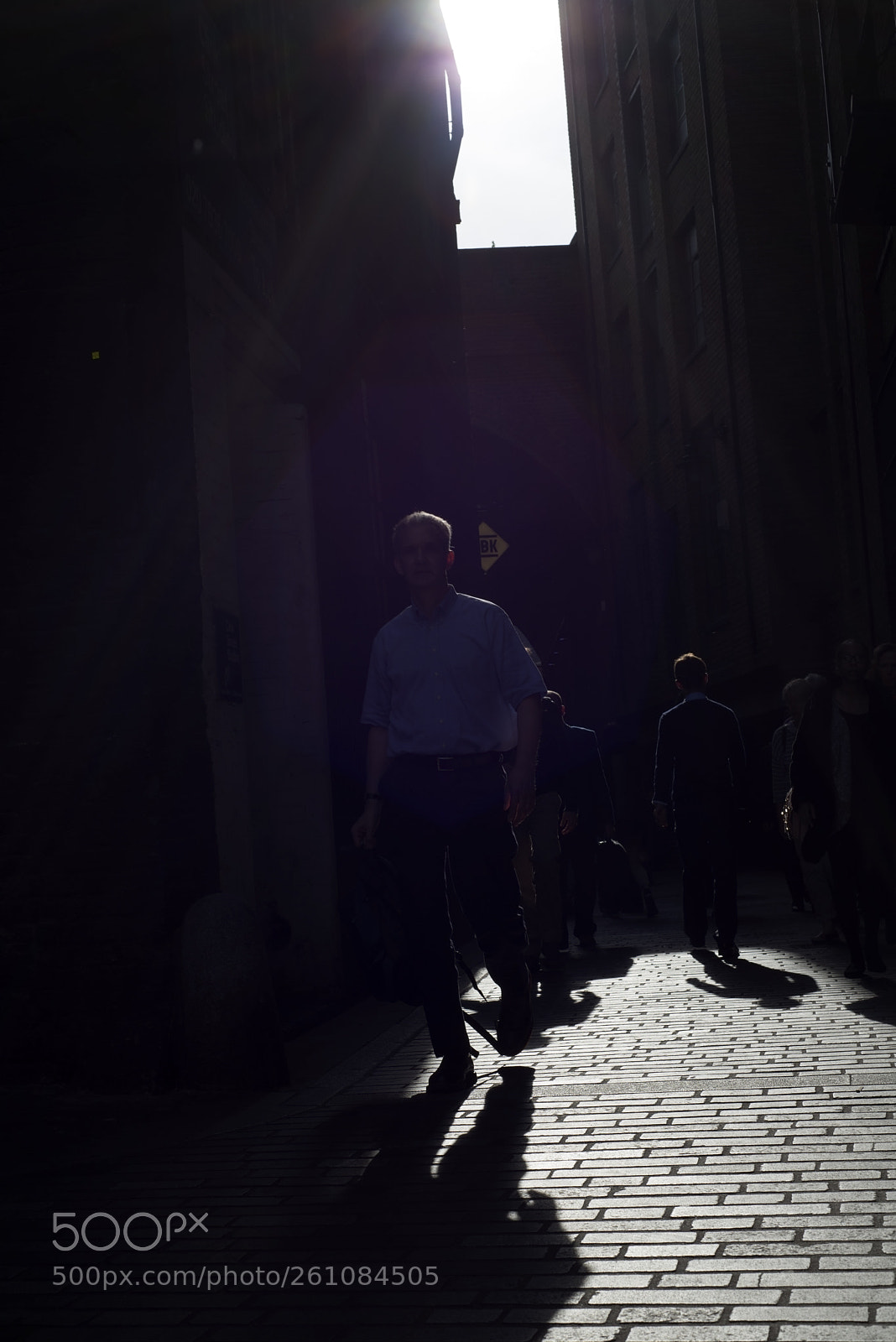 Nikon D610 sample photo. Workers walking down a photography
