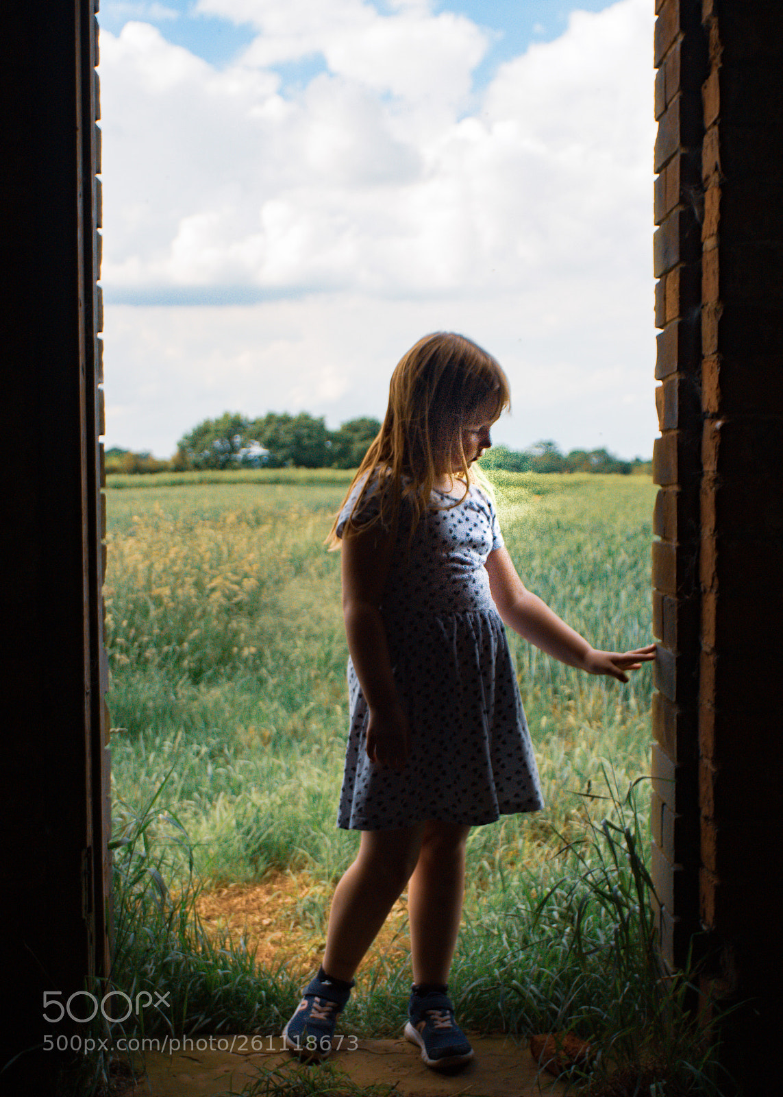 Sony ILCA-77M2 sample photo. Girl in a doorway. photography