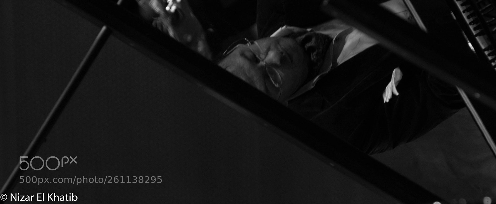 Nikon D5200 sample photo. Reflecting a pianist  photography