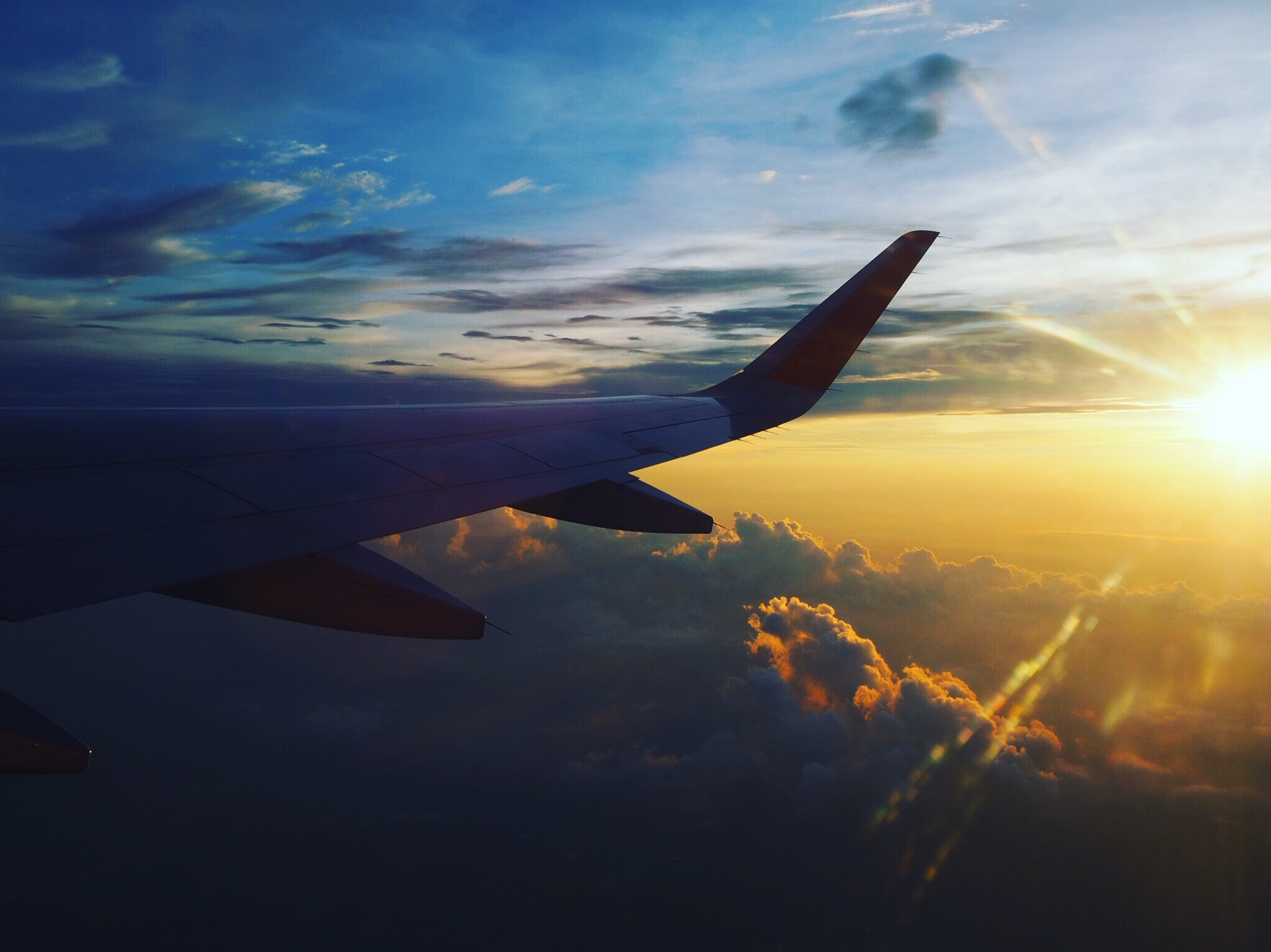 Olympus OM-D E-M10 III sample photo. Airplane with sky photography