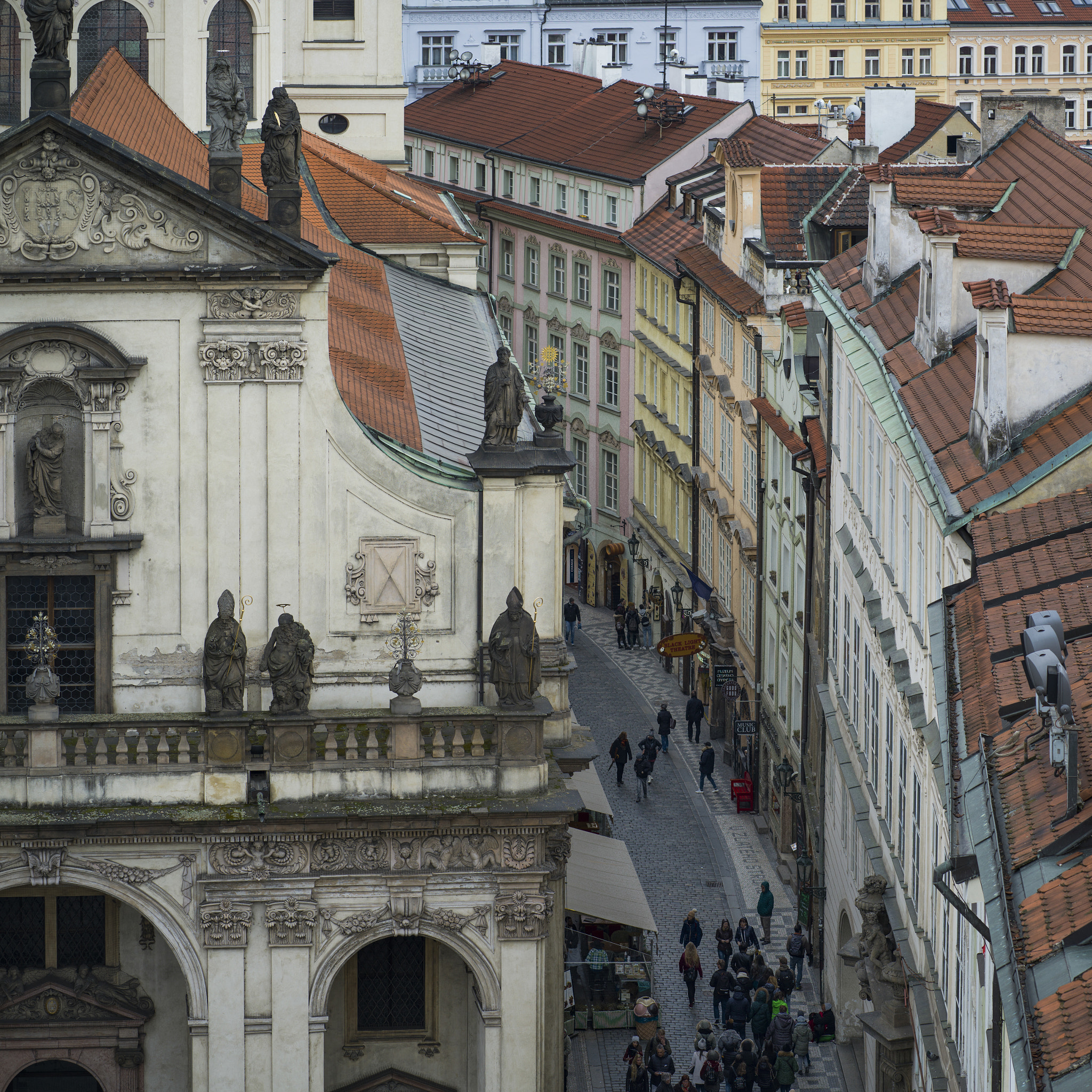 Hasselblad X1D-50c sample photo. People walking on street seen from old town bridge tower, prague photography