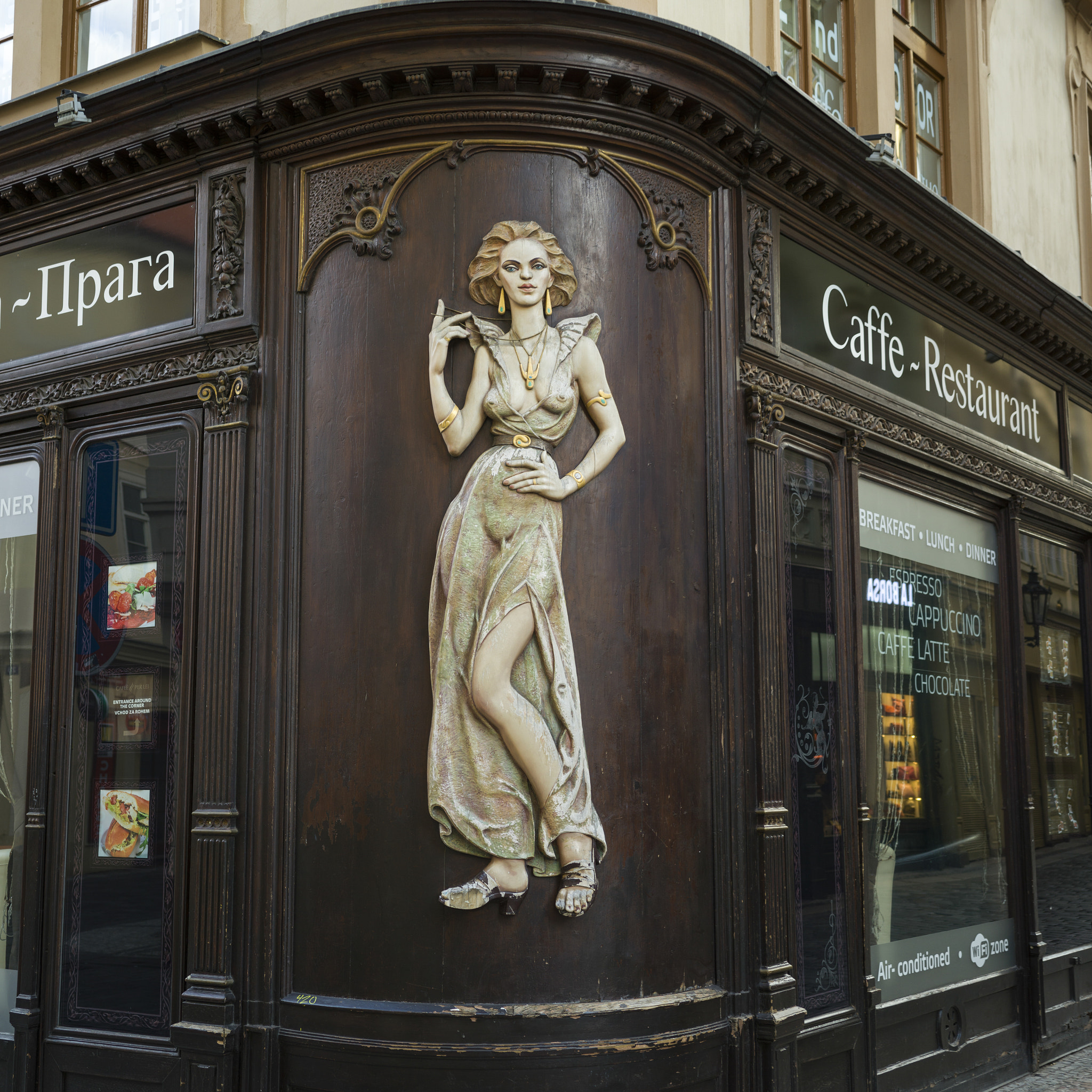 Hasselblad X1D-50c sample photo. Carving on the exterior wall of a restaurant, prague, czech repu photography