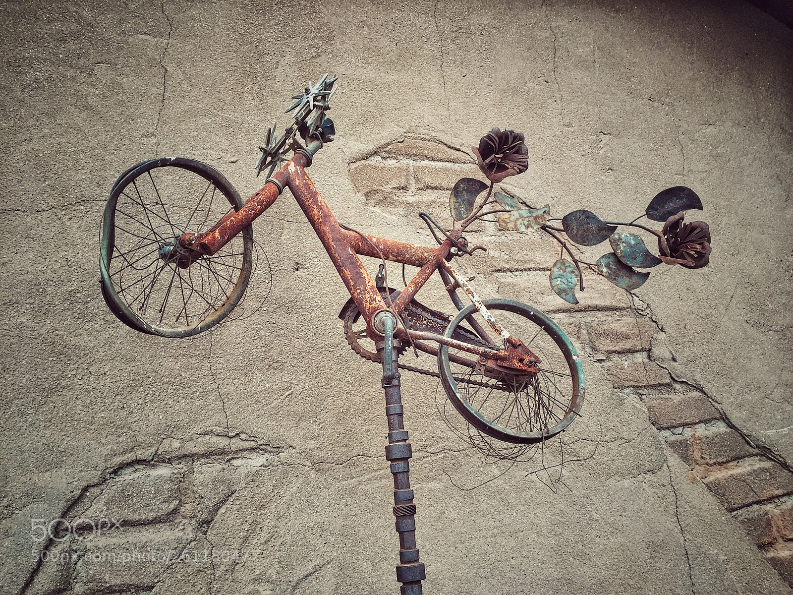 Apple iPhone 6 sample photo. Bicycle on wall photography