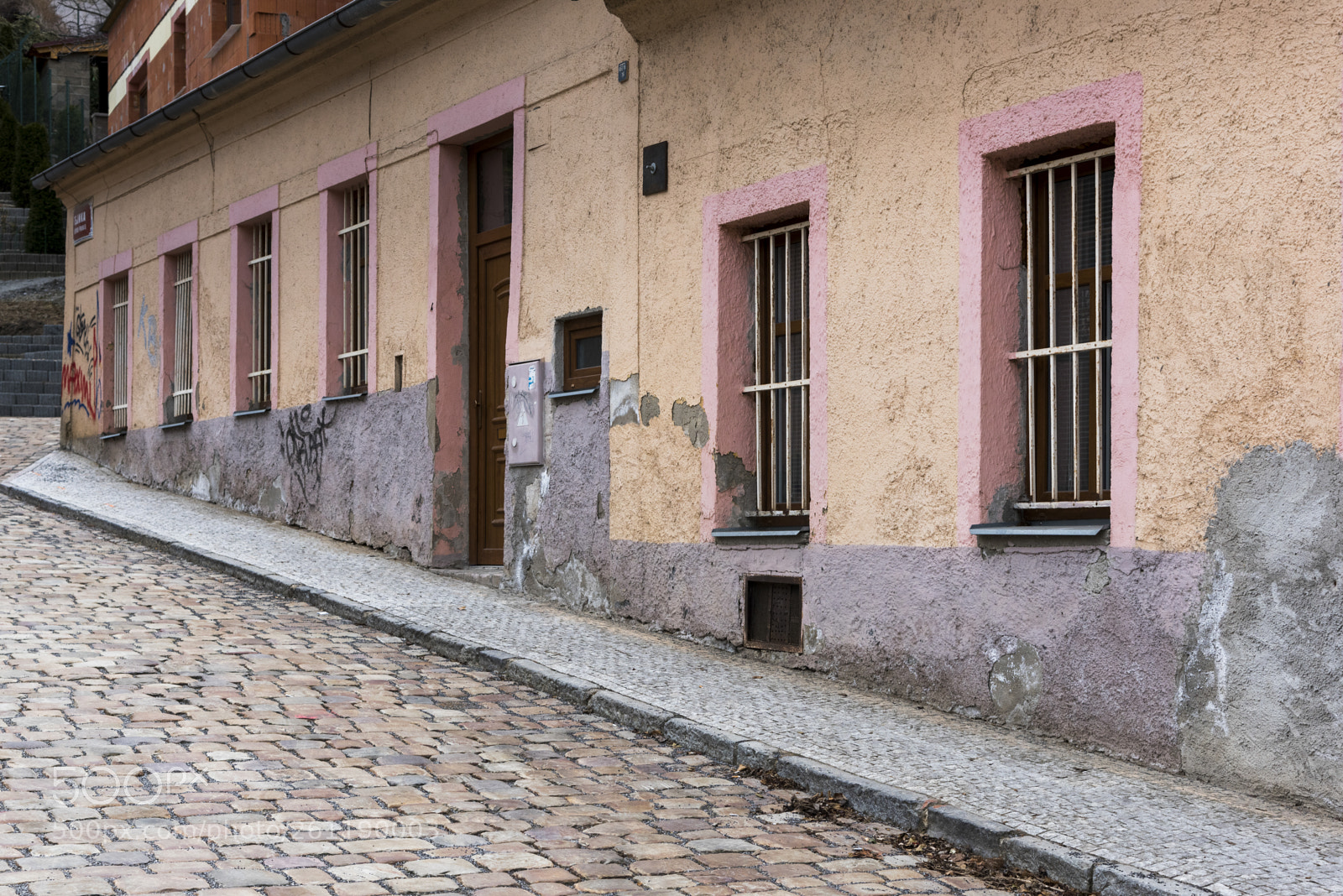 Nikon D810 sample photo. Weathered buildings along street photography