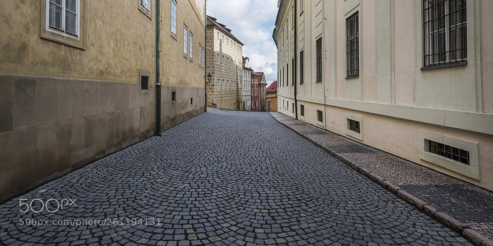 Nikon D810 sample photo. Buildings along narrow cobblestone photography