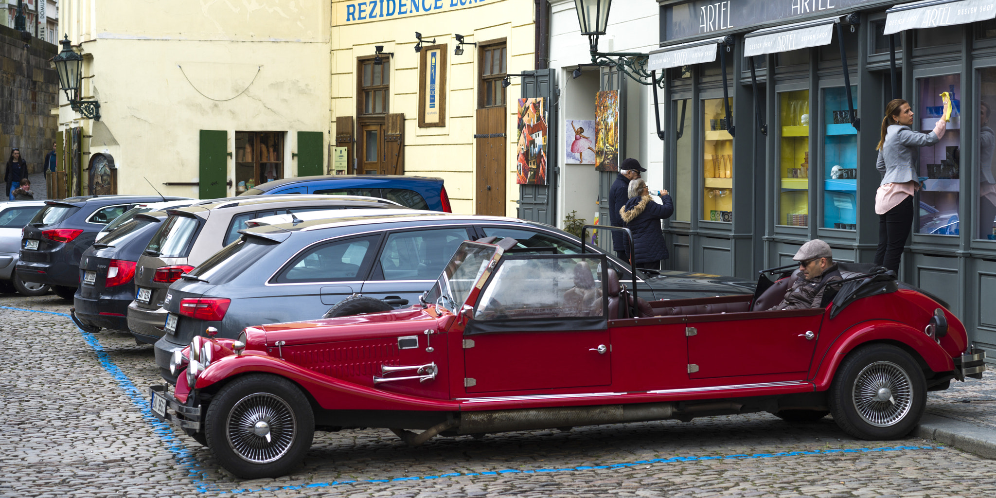 Hasselblad X1D-50c sample photo. Cars parked at roadside in front of store, prague, czech republi photography