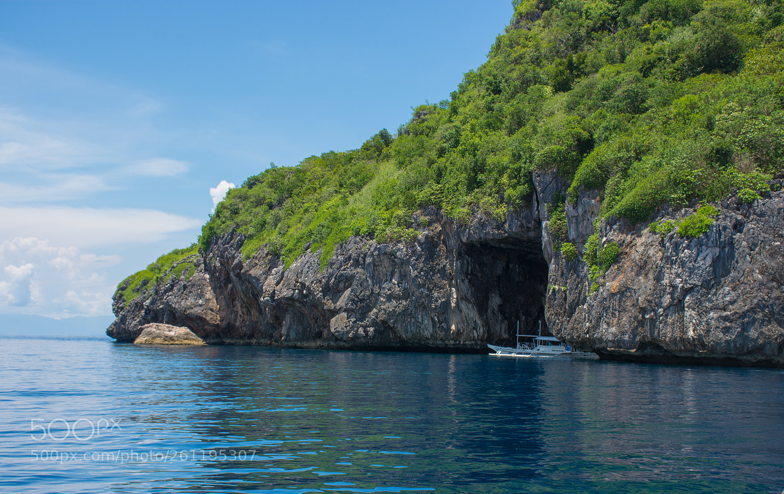 Nikon D5200 sample photo. Sea and boat in photography