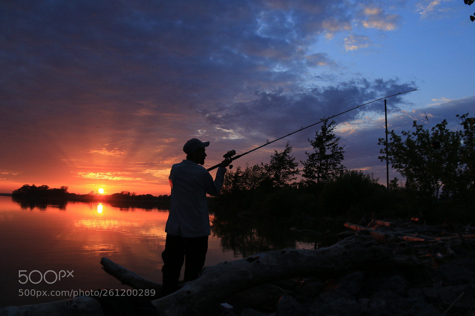 Canon EF-S 18-200mm F3.5-5.6 IS sample photo. Fisherman sunset photography