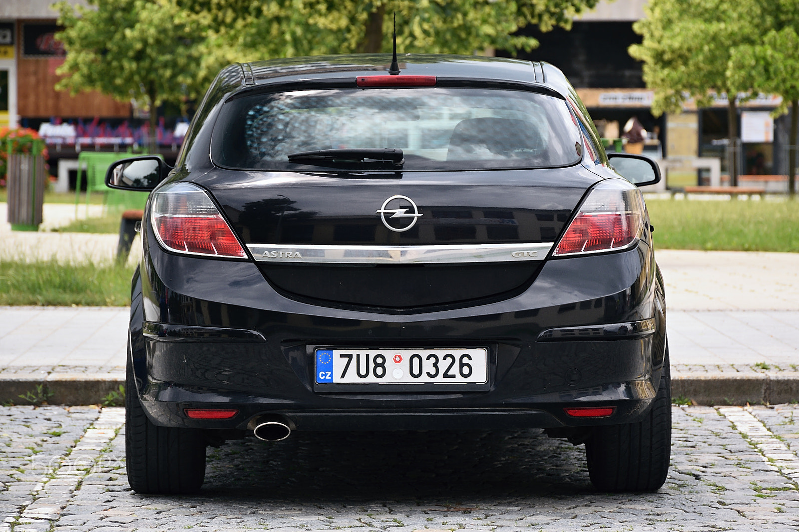 Nikon D5300 sample photo. Vsetin, czech republic - june 02, 2018: black car opel astra h stand on namesti svobody square in... photography