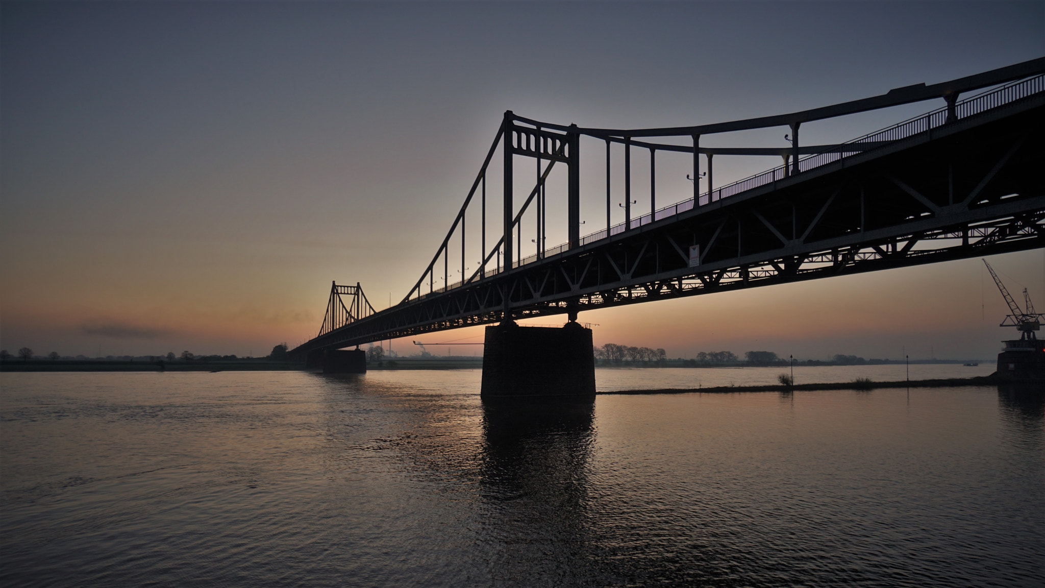Sony E 10-18mm F4 OSS sample photo. Bridge before sunrise. photography
