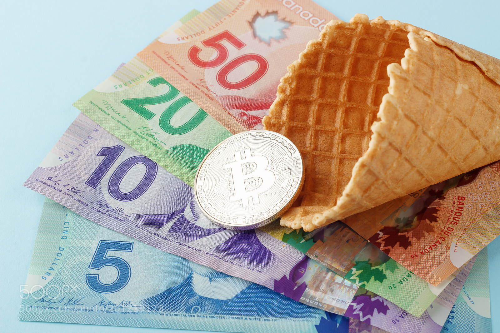 Canon EOS 600D (Rebel EOS T3i / EOS Kiss X5) sample photo. Canadian banknotes on blue photography