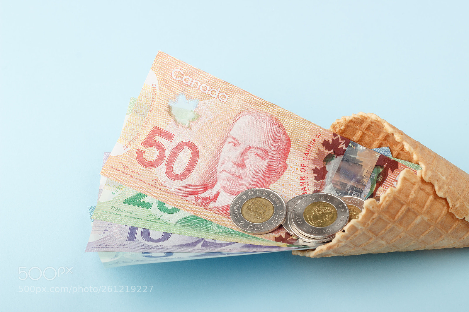 Canon EOS 600D (Rebel EOS T3i / EOS Kiss X5) sample photo. Canadian banknotes on blue photography