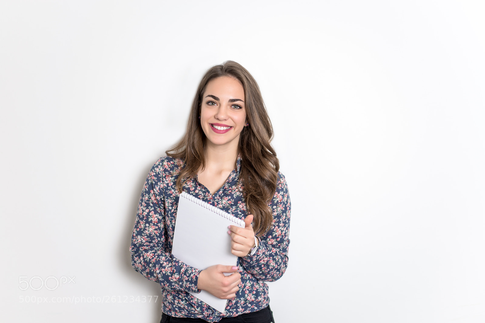 Nikon D610 sample photo. Young businesswoman holding folder photography