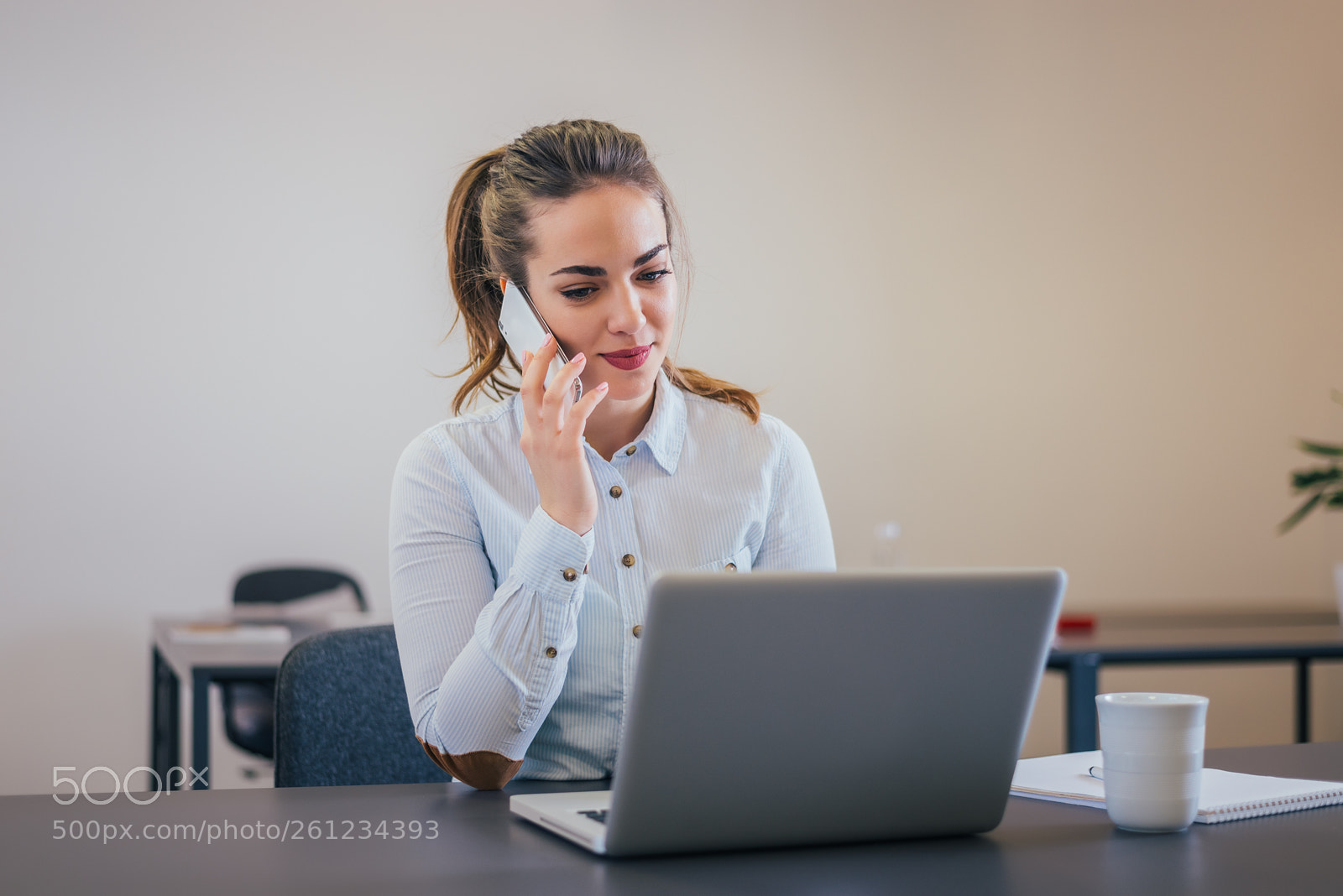 Nikon D610 sample photo. Smiling young businesswoman sitting photography
