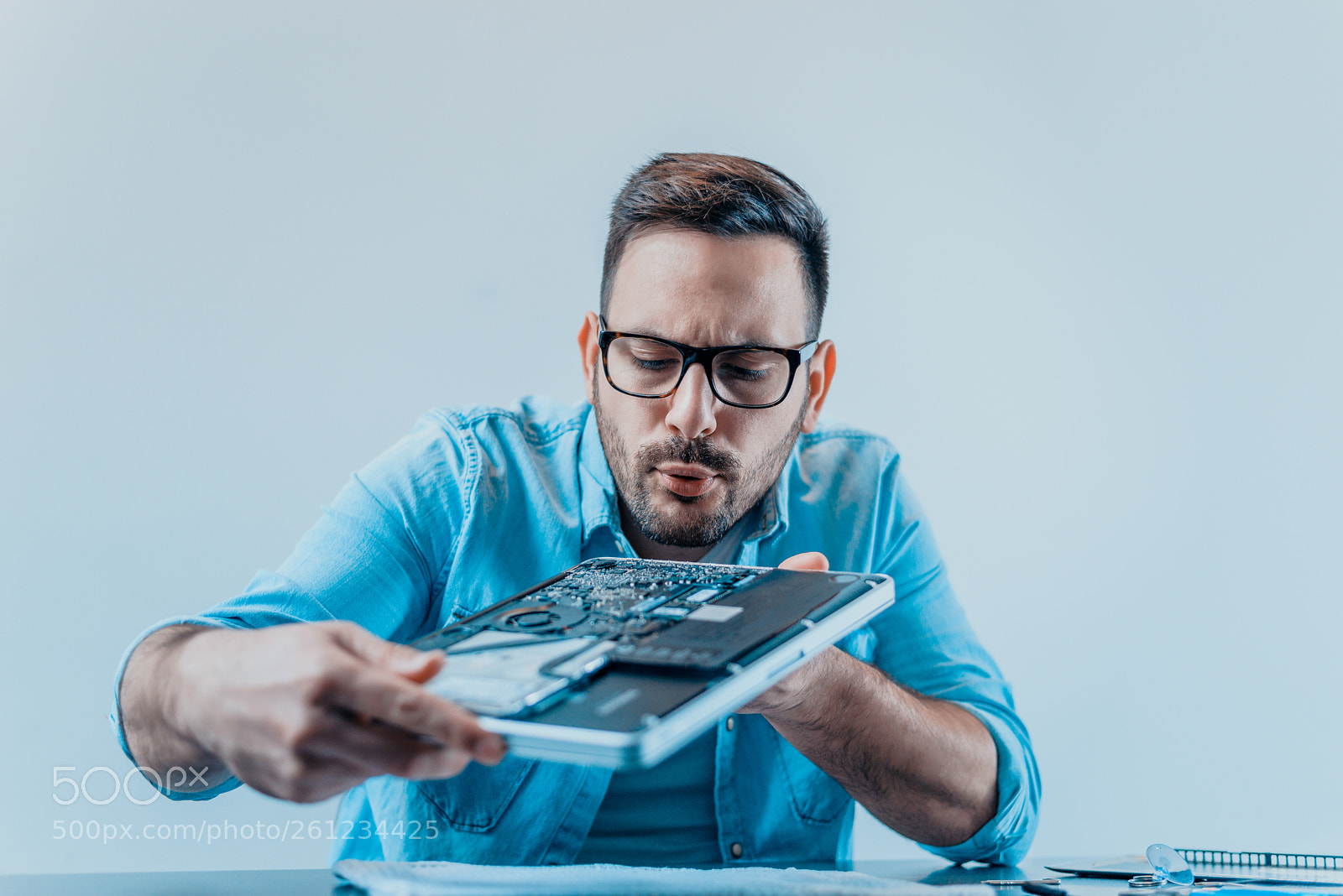 Nikon D610 sample photo. Men repairing and cleaning photography