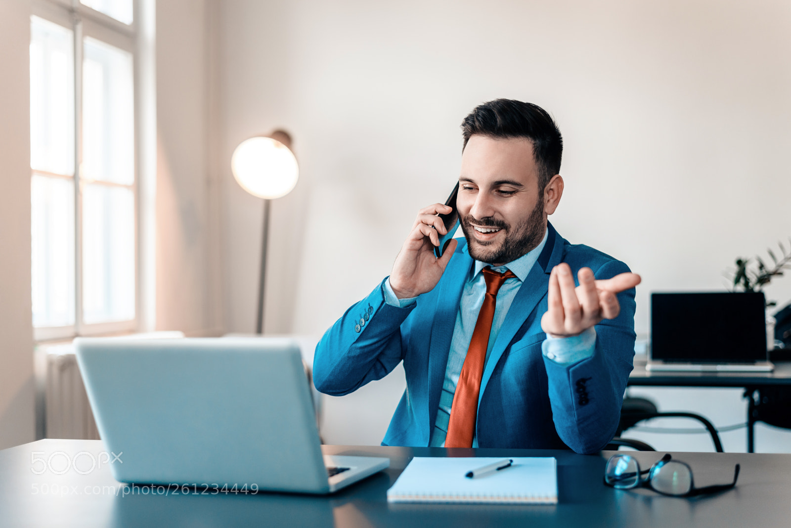 Nikon D610 sample photo. Handsome businessman talking on photography