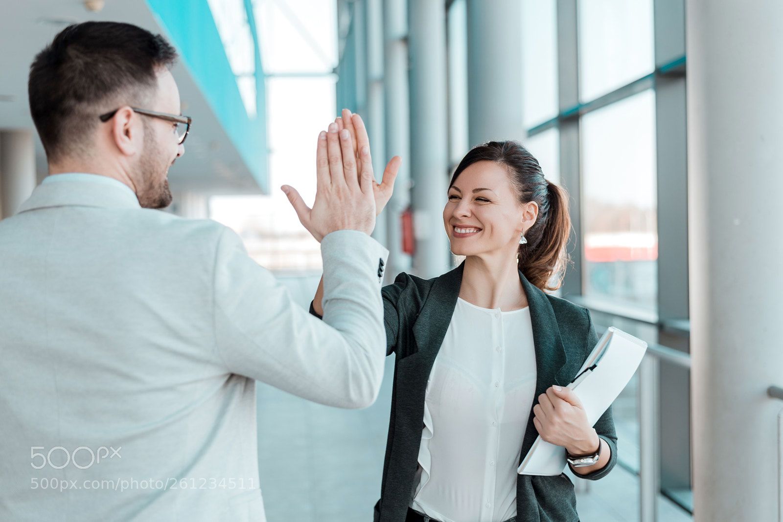 Nikon D610 sample photo. Two excited business colleagues photography