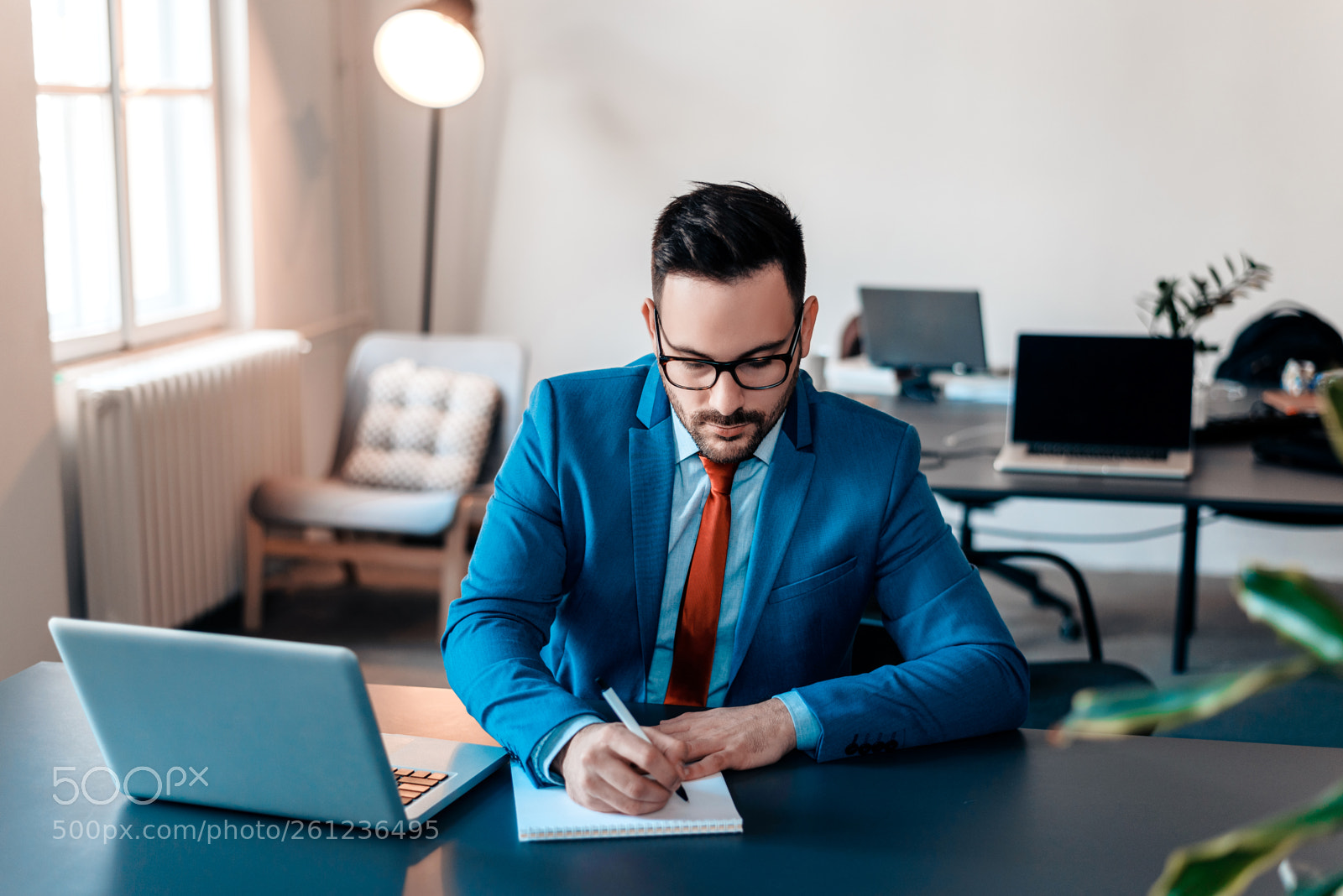 Nikon D610 sample photo. Young handsome businessman writing photography