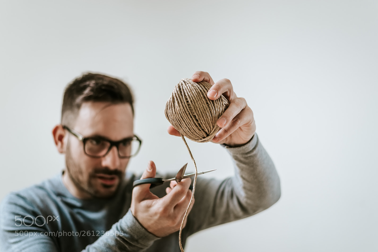 Nikon D610 sample photo. Man cutting twine. photography