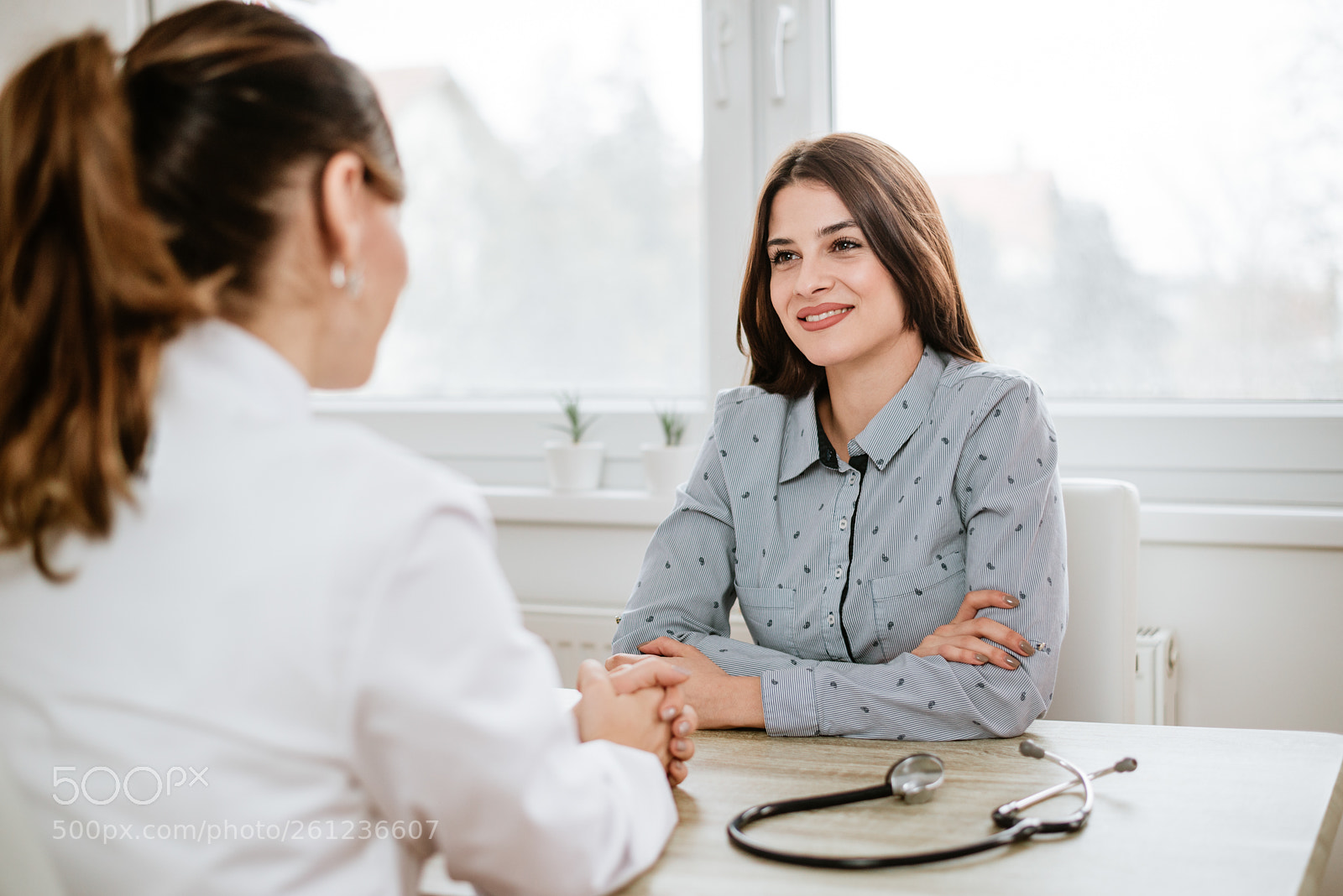 Nikon D610 sample photo. Young woman at doctor's photography